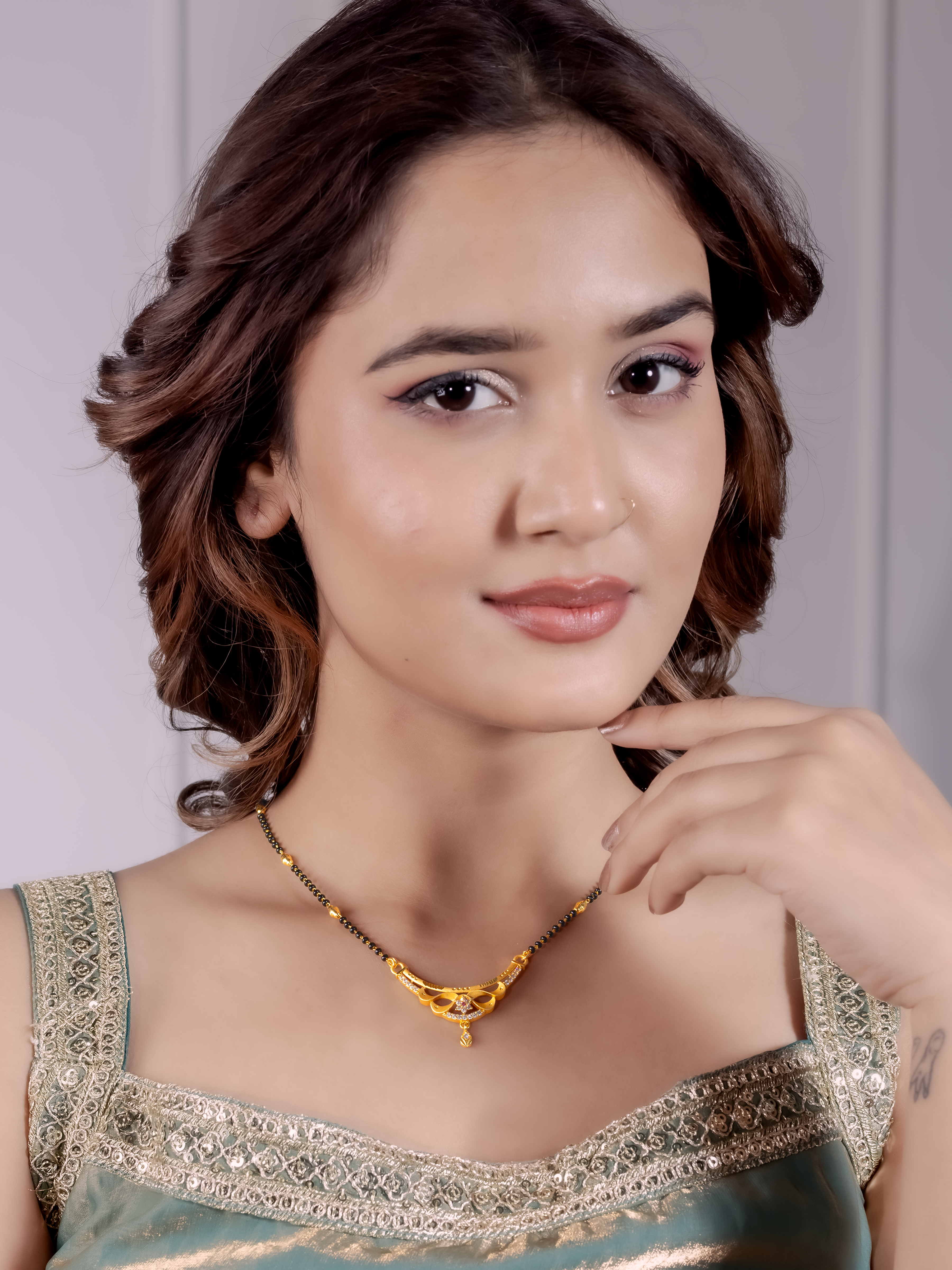 Graceful Gold Mangalsutra with Elegant Drop Pendant
