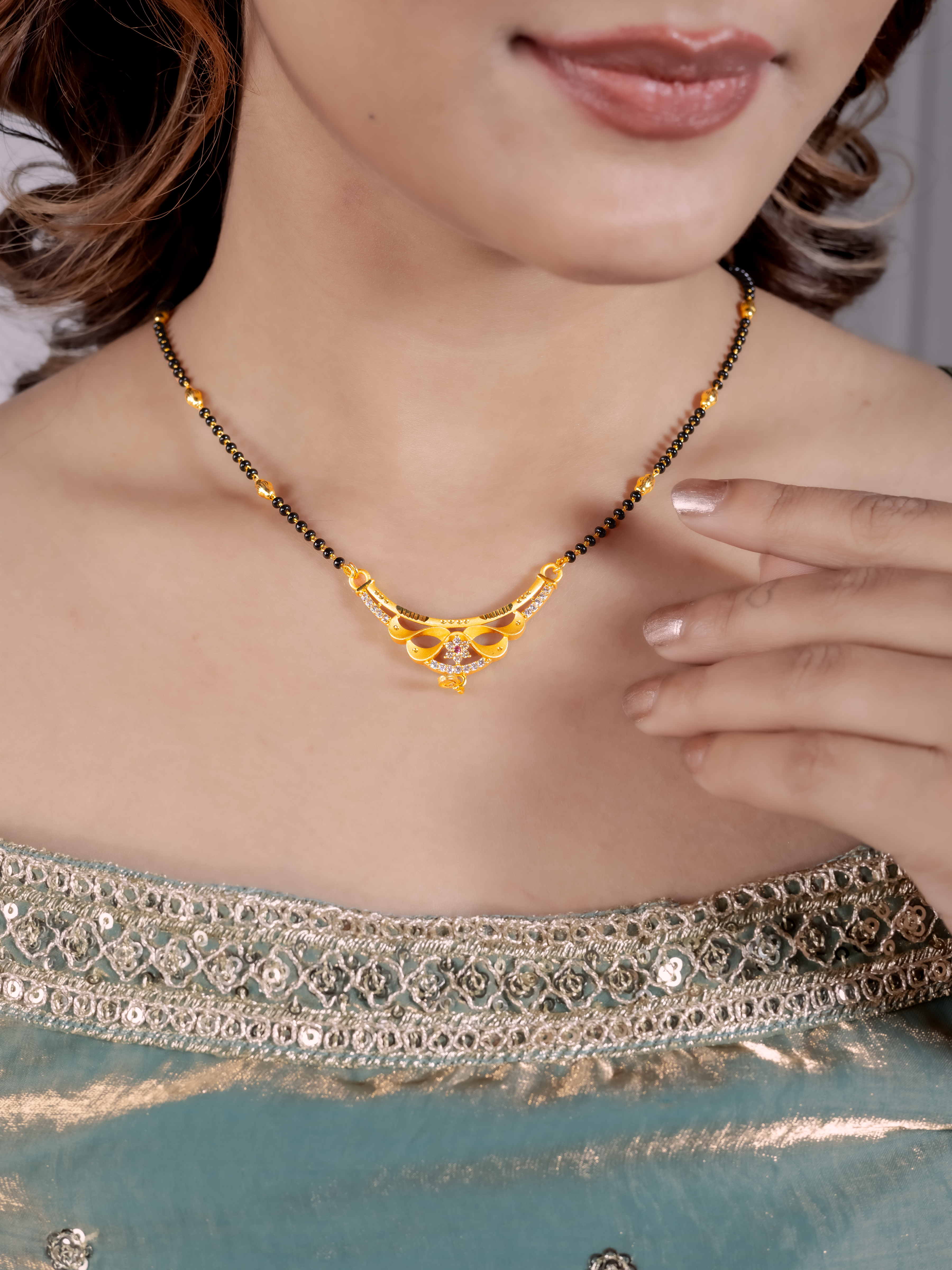 Graceful Gold Mangalsutra with Elegant Drop Pendant