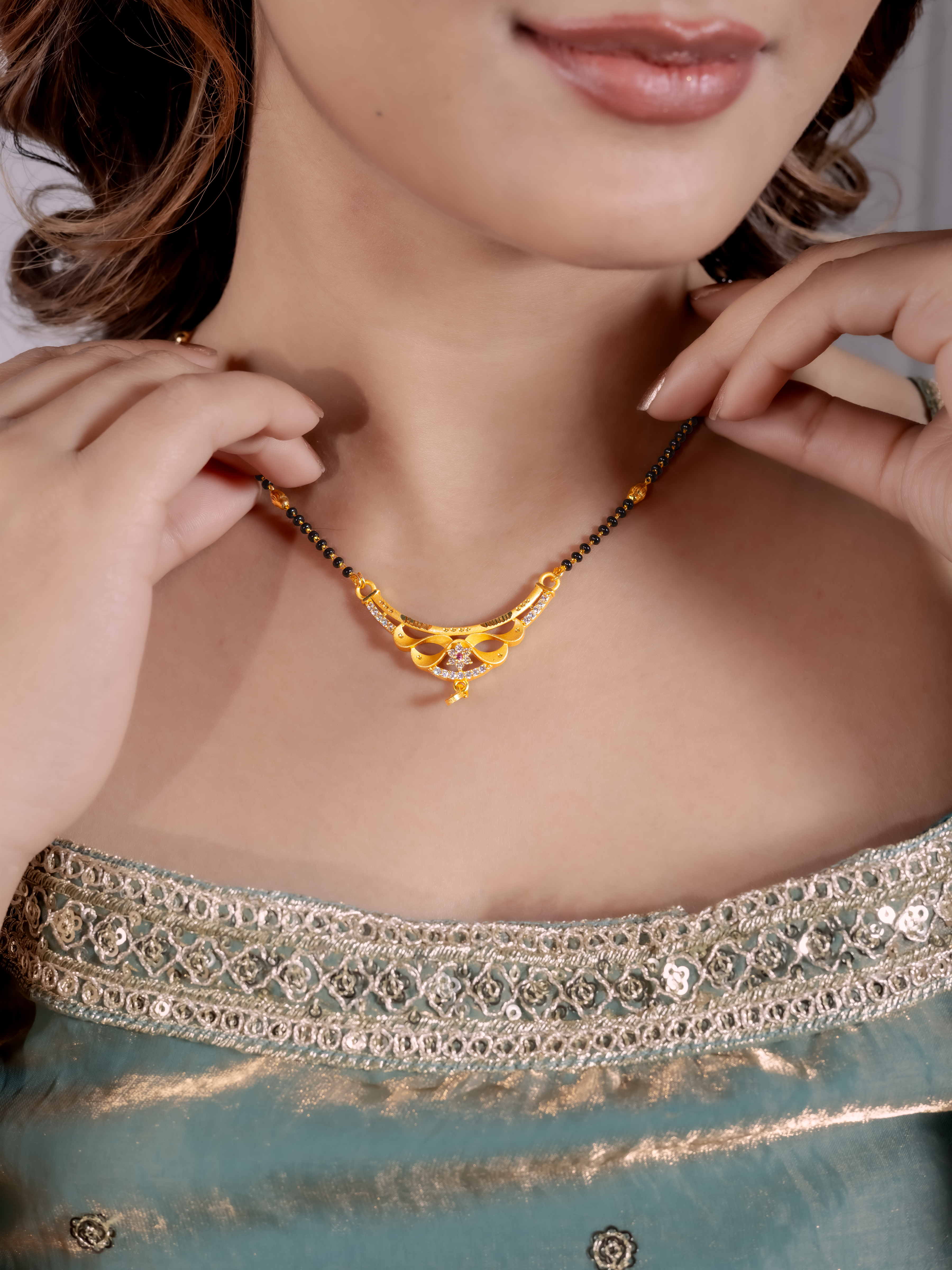 Graceful Gold Mangalsutra with Elegant Drop Pendant