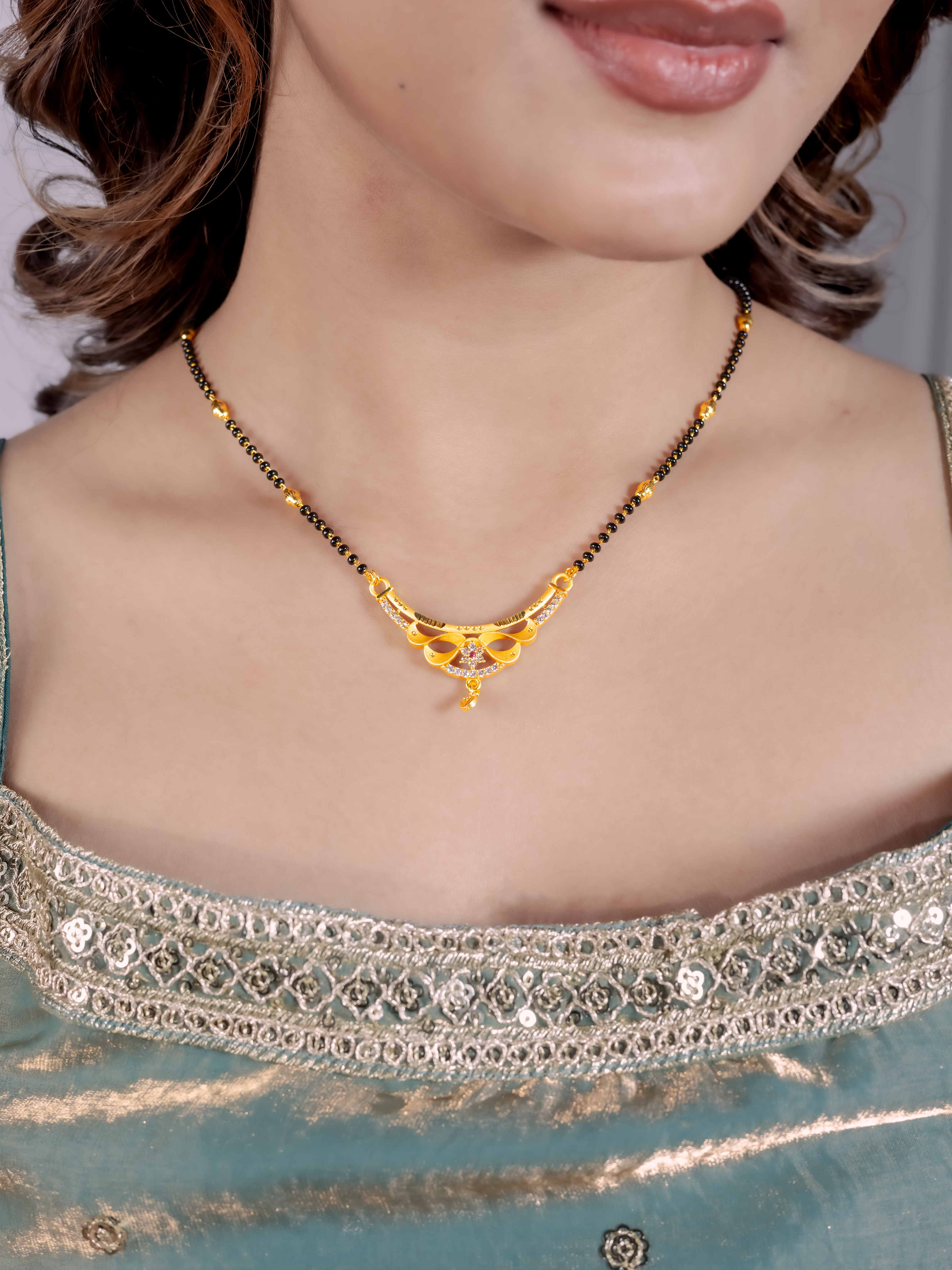 Graceful Gold Mangalsutra with Elegant Drop Pendant