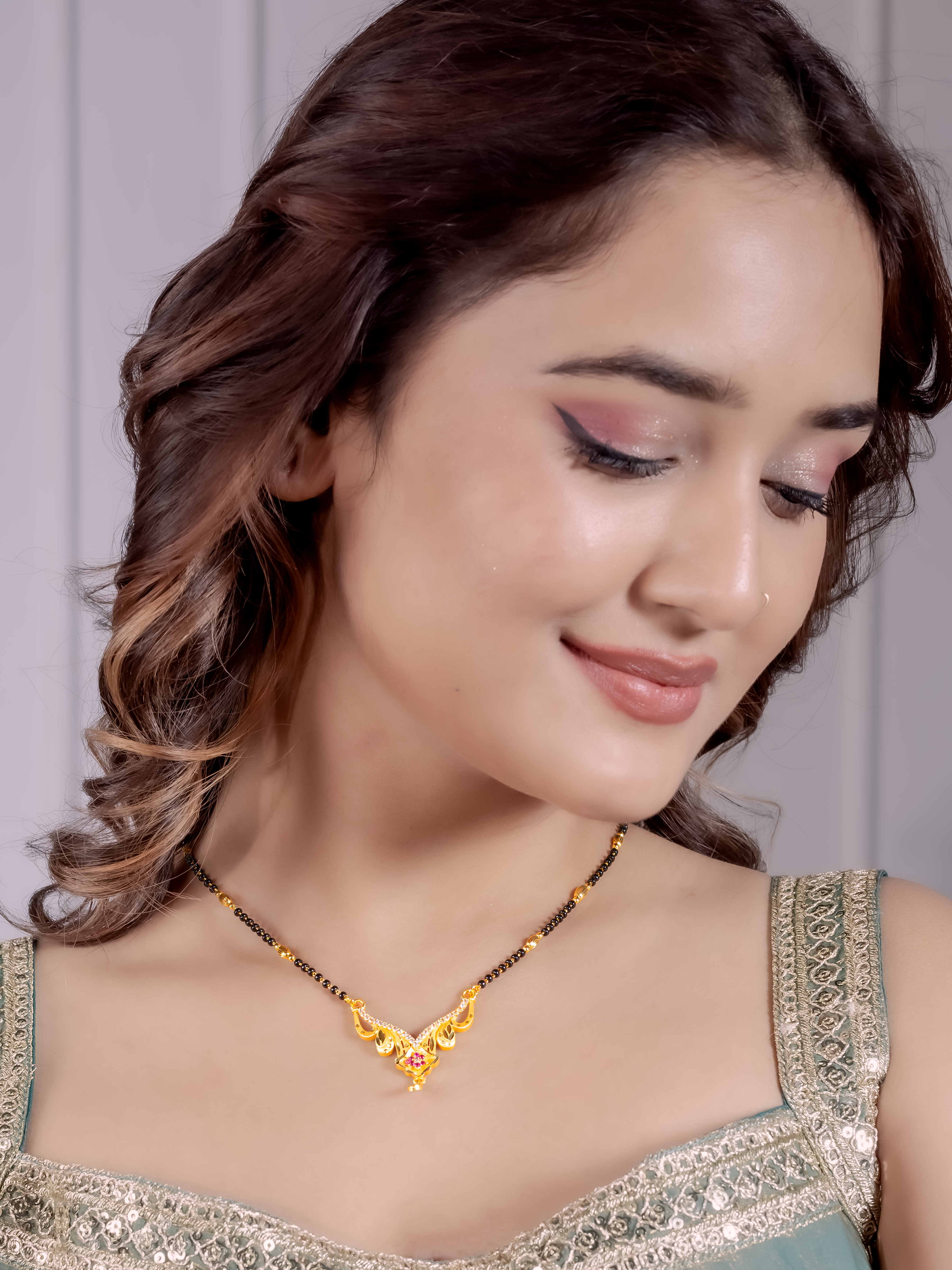 Graceful Gold Mangalsutra with Designer Pendant