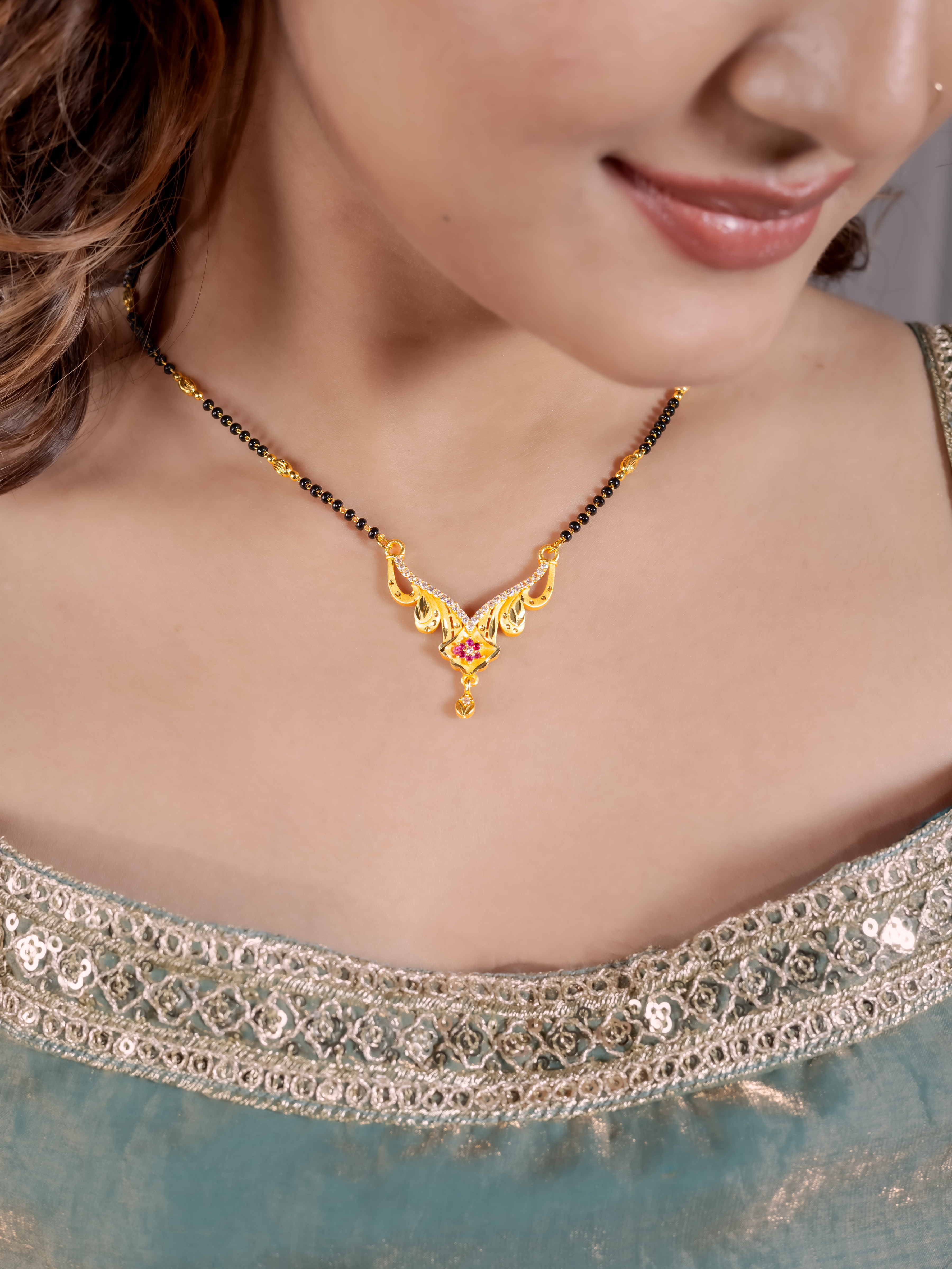 Graceful Gold Mangalsutra with Designer Pendant