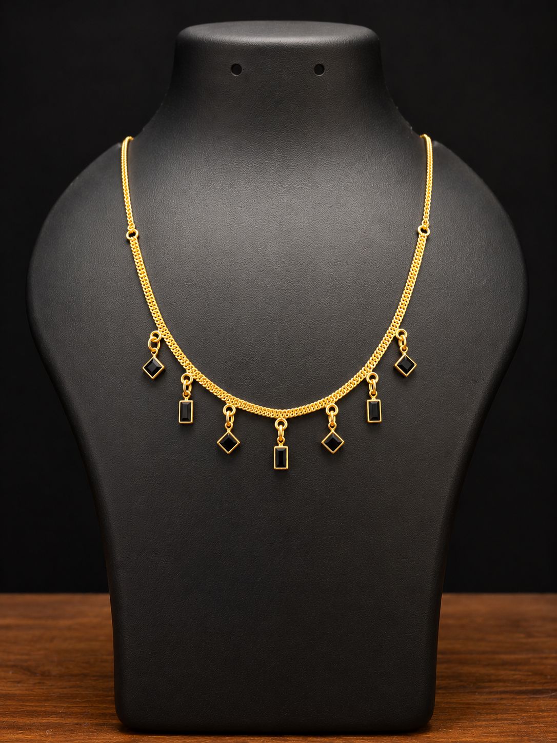 Gold Black Charm Tanmaniya